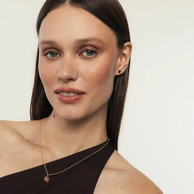 Kolczyk do piercingu typu labret; z czarną emalią, srebrny pozłacany